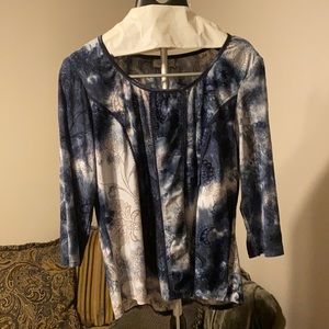 Blue and white shirt.